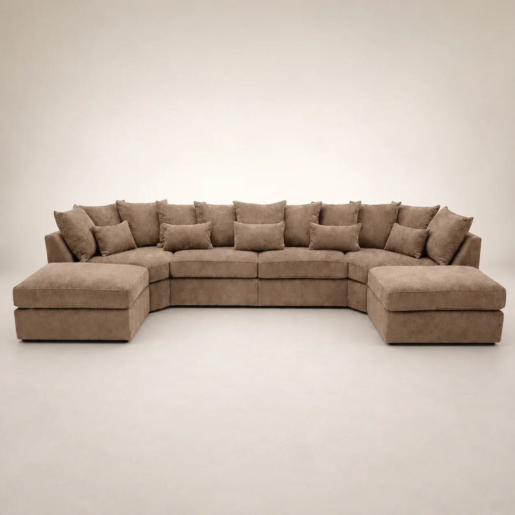 Luxury brown sectional sofa with chaise lounges and plush cushions, perfect for modern living rooms.