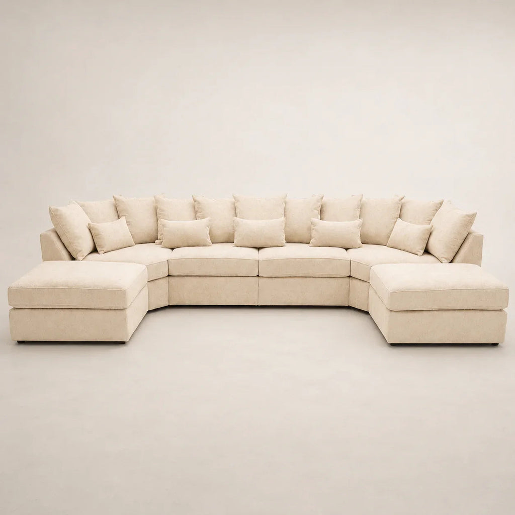 Luxury beige sectional sofa with chaise lounges and plush cushions, ideal for modern living rooms