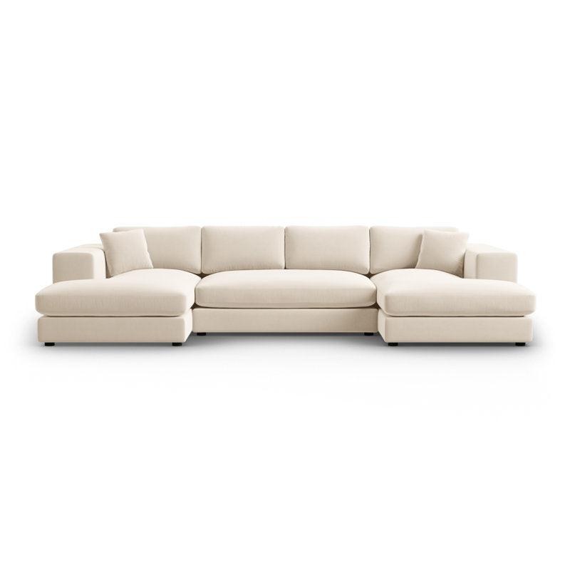 Modern U-shaped luxury sofa in cream fabric with plush cushions, sectional seating, front view