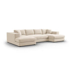 Modern U-shaped cream luxury sofa with wide chaise and plush cushions on white background