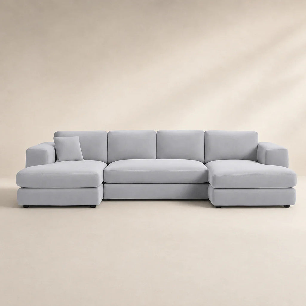 Modern grey sectional sofa with chaise lounges, perfect for luxury living rooms