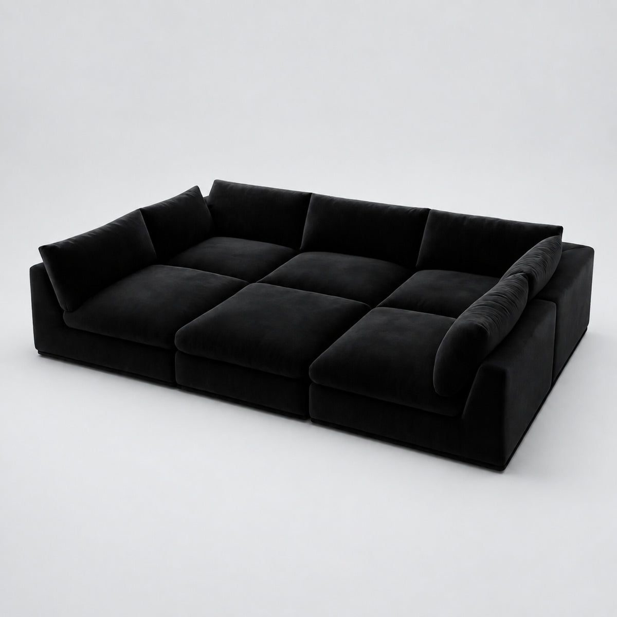 Nuvola Pit-Sectional Feather Cinema Sofa in midnight noir on a cold light grey studio background — CK Living