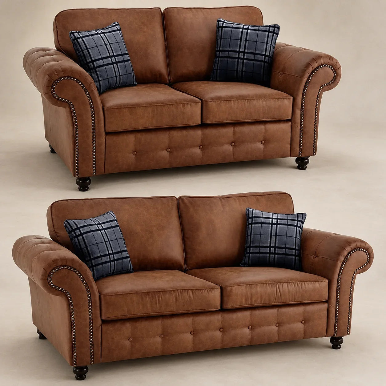 Brown leather two-seater sofa with rolled arms, nailhead trim, and plaid pillows, ideal for luxury living rooms.