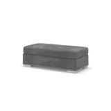 Grey velvet rectangular footstool with studded trim and low block legs on white background
