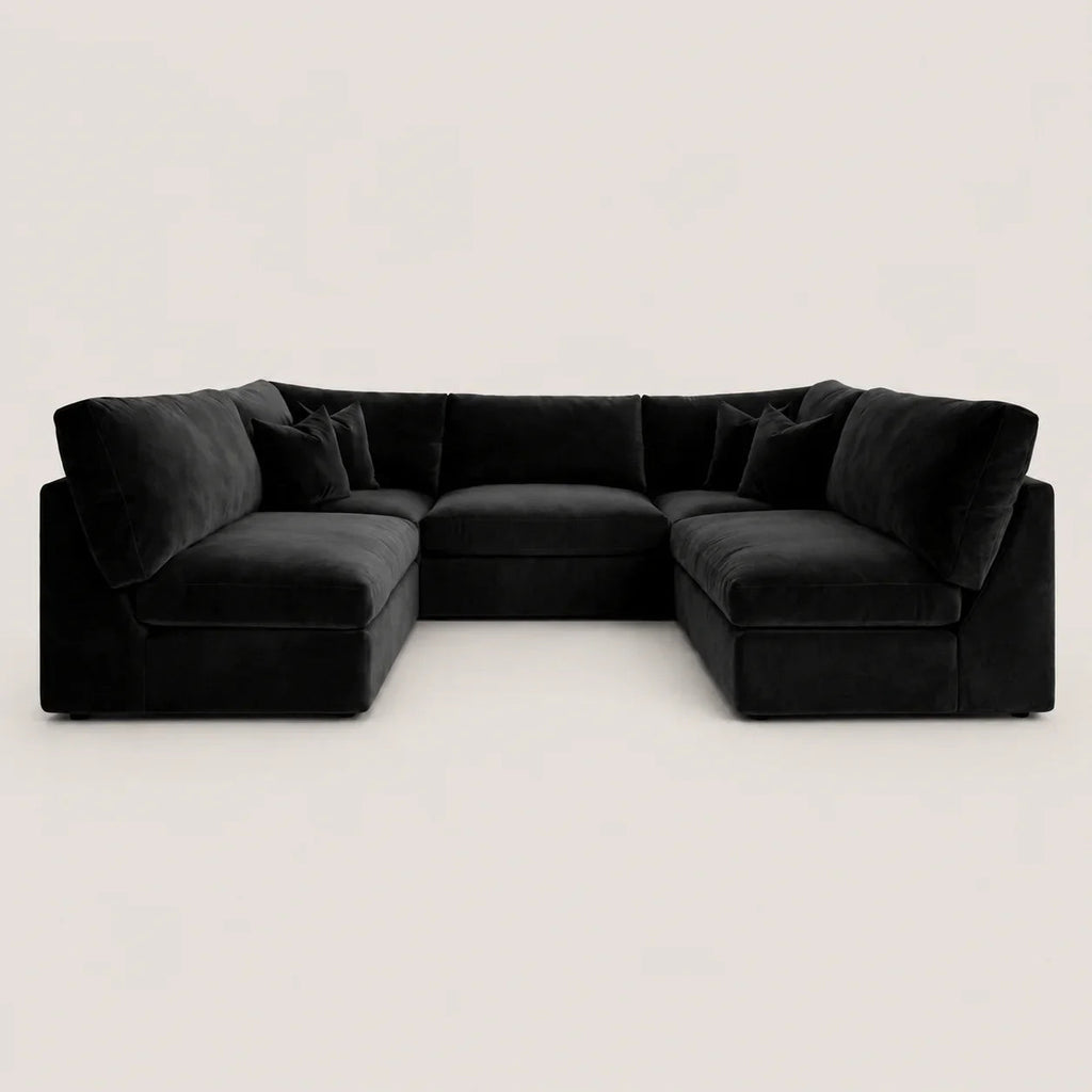 Luxury black velvet sectional sofa with plush cushions, modern L-shape design for living room