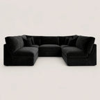 Luxury black velvet sectional sofa with plush cushions, modern L-shape design for living room