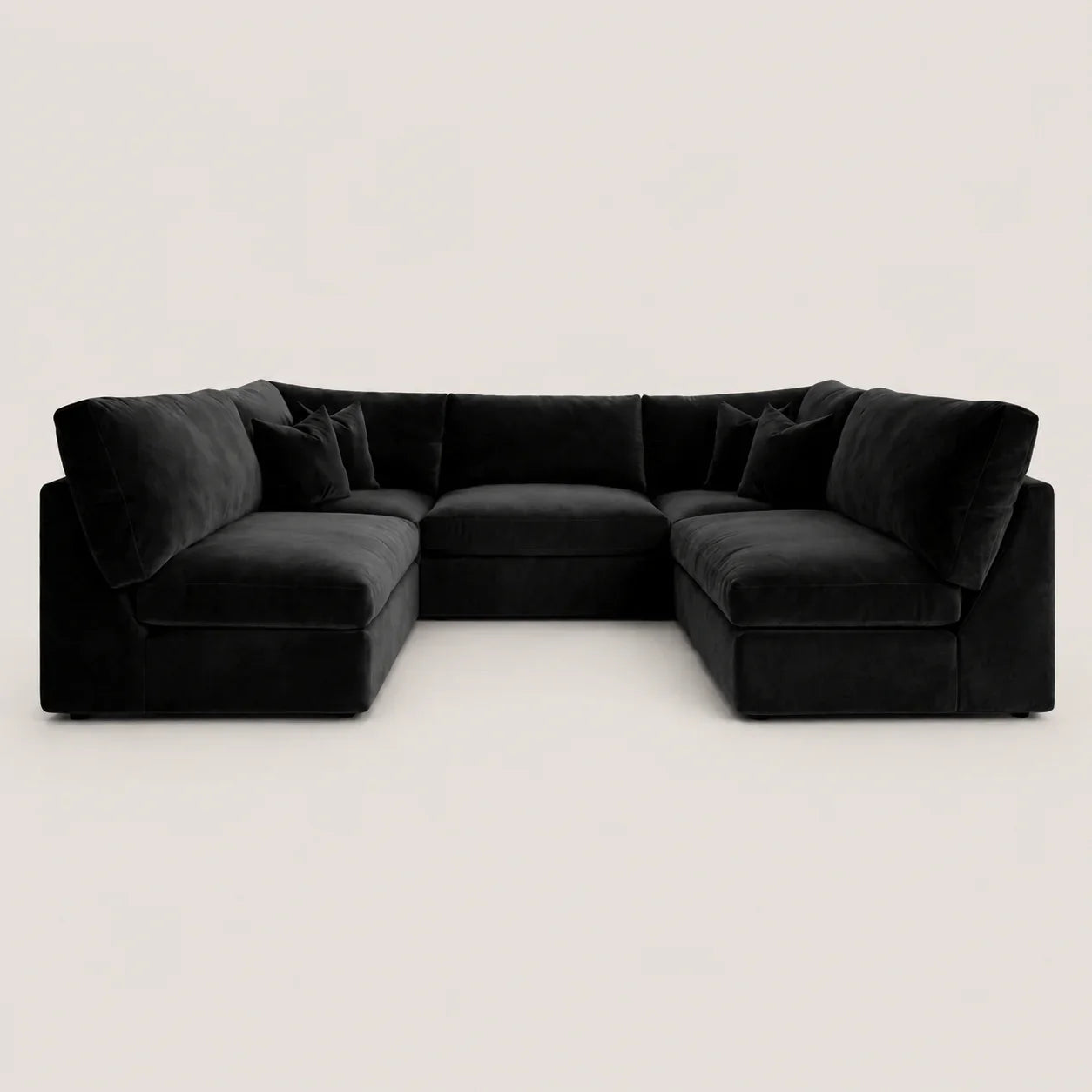 Luxury black velvet sectional sofa with plush cushions, modern L-shape design for living room