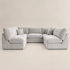 Luxury grey sectional sofa with plush cushions, ideal for modern living rooms