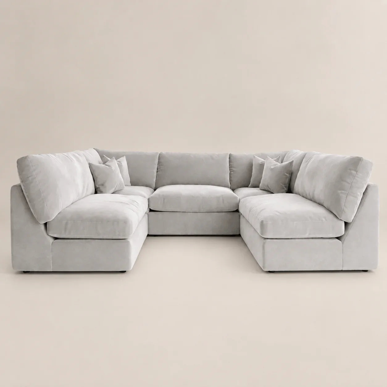 Luxury grey sectional sofa with plush cushions, ideal for modern living rooms