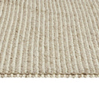 Cream and beige striped woven rug with textured loop pile, ideal for living room or bedroom decor.