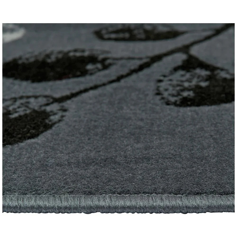 Grey area rug with black floral pattern, soft textured pile and stitched edge for modern living rooms