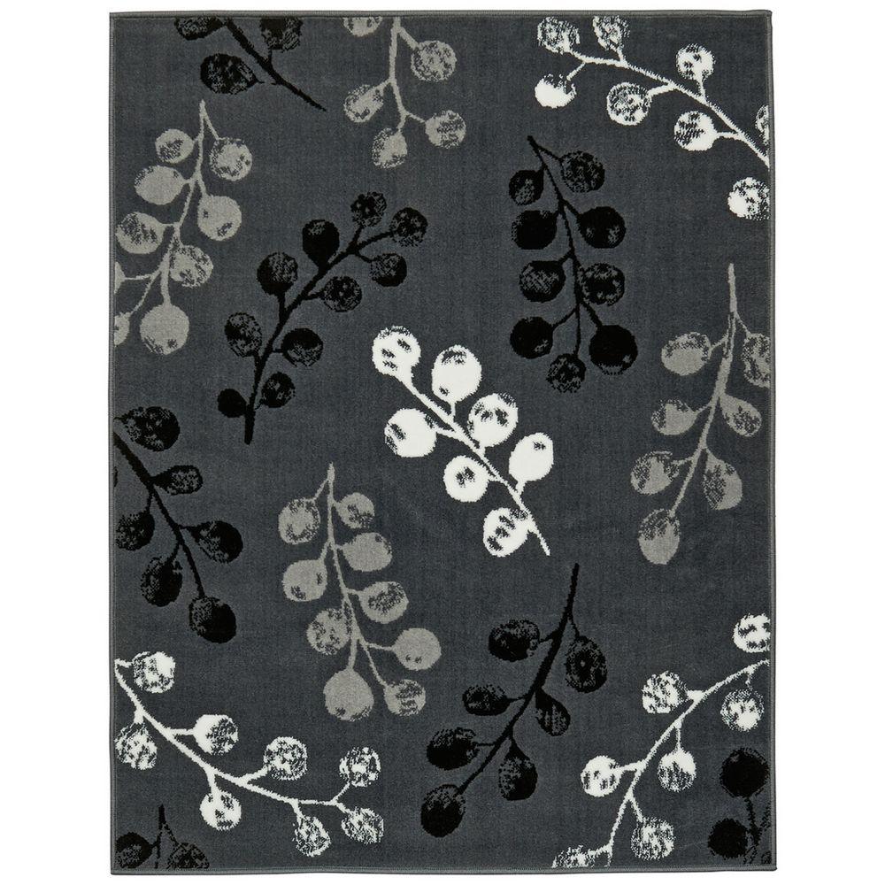 Gray area rug with black and white berry branch pattern for modern living room decor