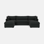 Modern dark grey U-shaped sectional sofa with generous cushions on a plain background