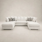 Luxury white sectional sofa with chaise lounges and patterned throw pillows, perfect for modern living rooms.