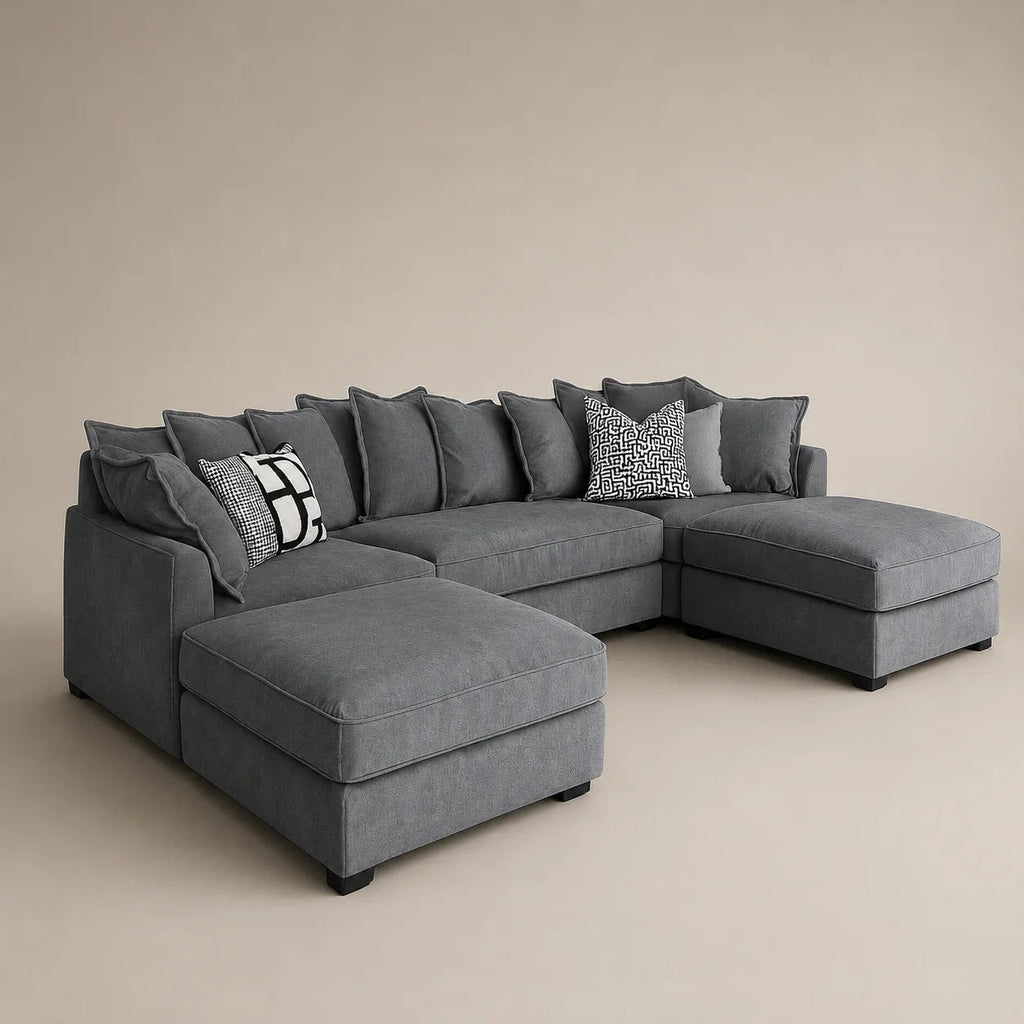 Luxury gray sectional sofa with chaise lounges and patterned throw pillows for modern living rooms