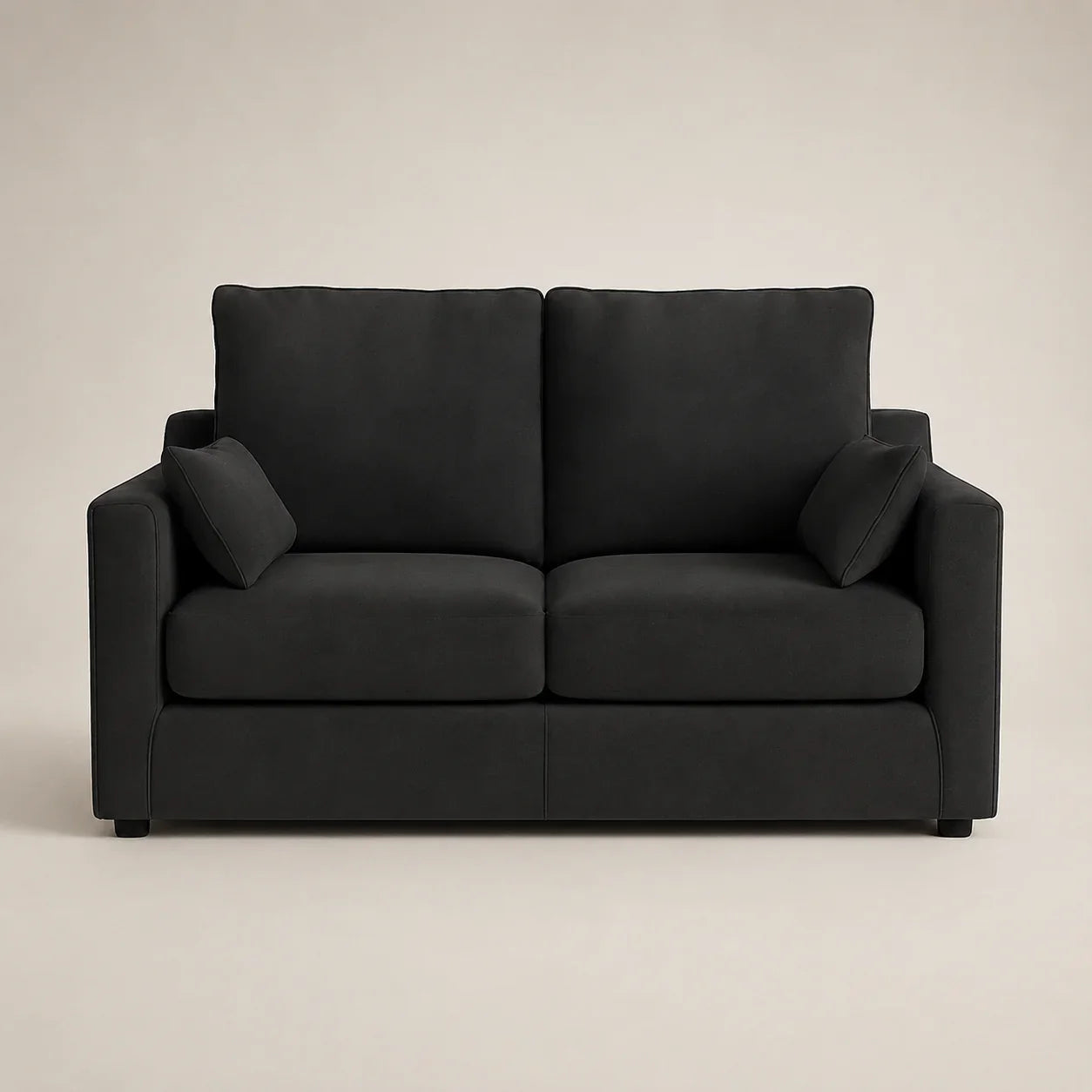 Black two-seater sofa with plush cushions, modern living room furniture