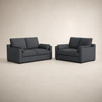 Modern dark grey fabric sofas in minimalist setting, perfect for luxury living rooms