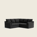 Luxury black velvet corner sofa with plush cushions, ideal for modern living rooms
