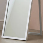 White full-length floor mirror with slim frame, modern bedroom decor