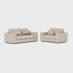 Modern beige 3-seater and 2-seater sofa set with cushions on a plain background