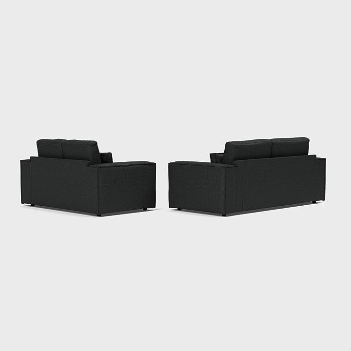 Modern black 3-seater and 2-seater sofa set on white background
