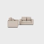 Modern beige 3 and 2 seater fabric sofa set with plush cushions on a white background