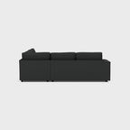Modern dark grey double corner sofa with clean lines, viewed from the back on white background