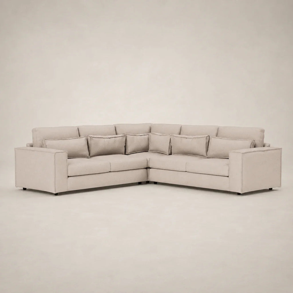 Luxury beige L-shaped sectional sofa with plush cushions, ideal for modern living rooms