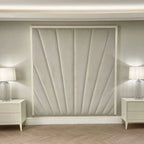 Sunburst silver velvet wall-mounted headboard with luxury art deco design, flanked by lamps.