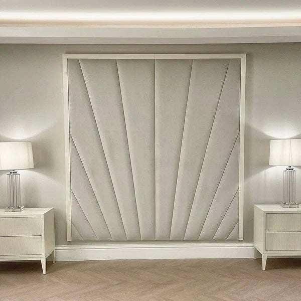 Sunburst silver velvet wall-mounted headboard with luxury art deco design, flanked by lamps.