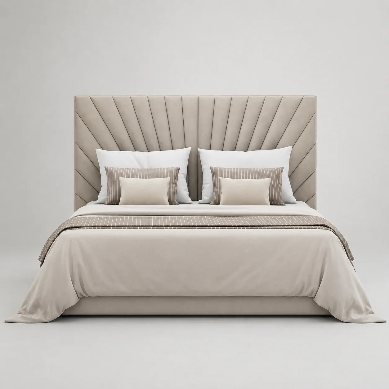 Luxury upholstered bed with tufted headboard, neutral bedding, and striped accent pillows