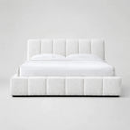 White luxury upholstered bed with tufted headboard and base, modern bedroom furniture
