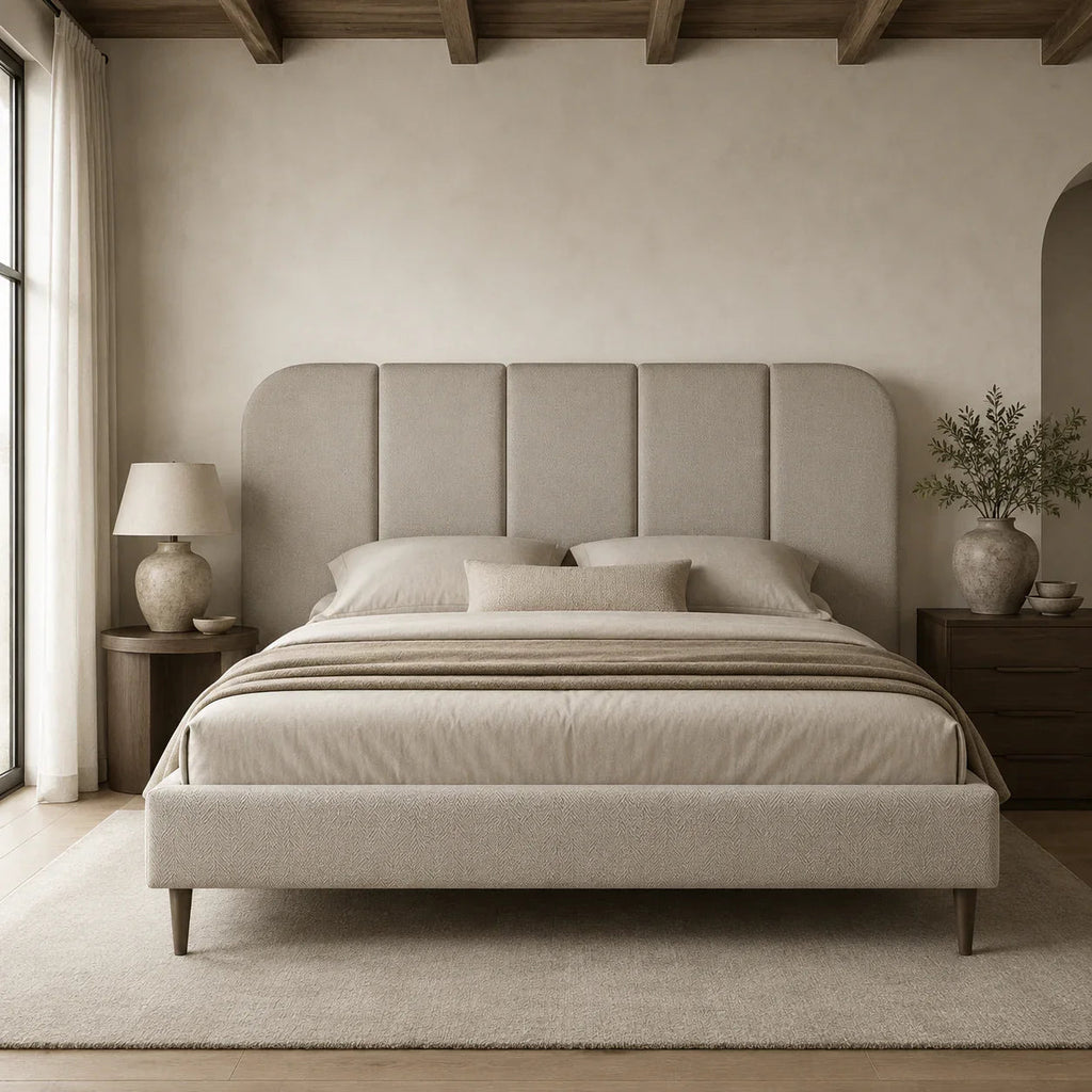 Luxury upholstered bed with tufted headboard in neutral tones, styled in modern bedroom with wooden beams