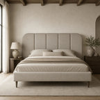 Luxury upholstered bed with tufted headboard in neutral tones, styled in modern bedroom with wooden beams