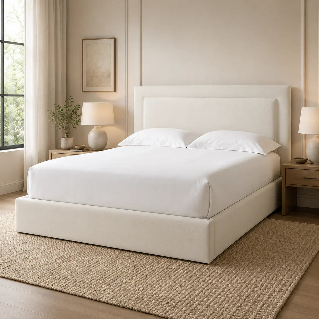 Luxury upholstered bed with white linens in modern bedroom, perfect for UK homes