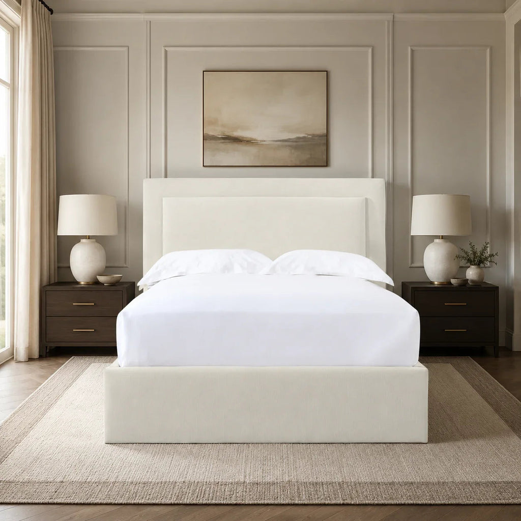 Luxury upholstered bed with white linens in elegant bedroom, modern nightstands and neutral decor