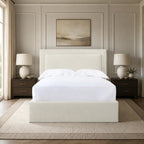 Luxury upholstered bed with white linens in elegant bedroom, modern nightstands and neutral decor