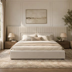 Luxury beige upholstered bed with tufted headboard, neutral bedding, and matching nightstands in modern bedroom