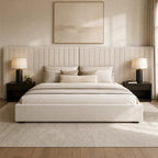 Luxury upholstered bed with tufted headboard, neutral bedding, and modern nightstands in a serene bedroom