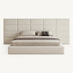 Luxury upholstered bed with tufted headboard, neutral bedding, and modern design for contemporary bedrooms.