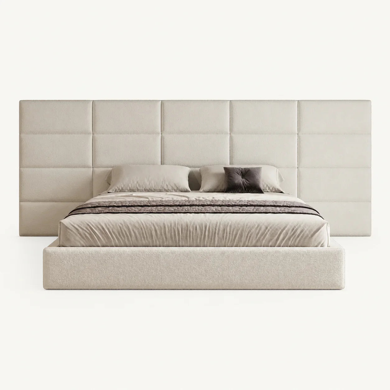 Luxury upholstered bed with tufted headboard, neutral bedding, and modern design for contemporary bedrooms.