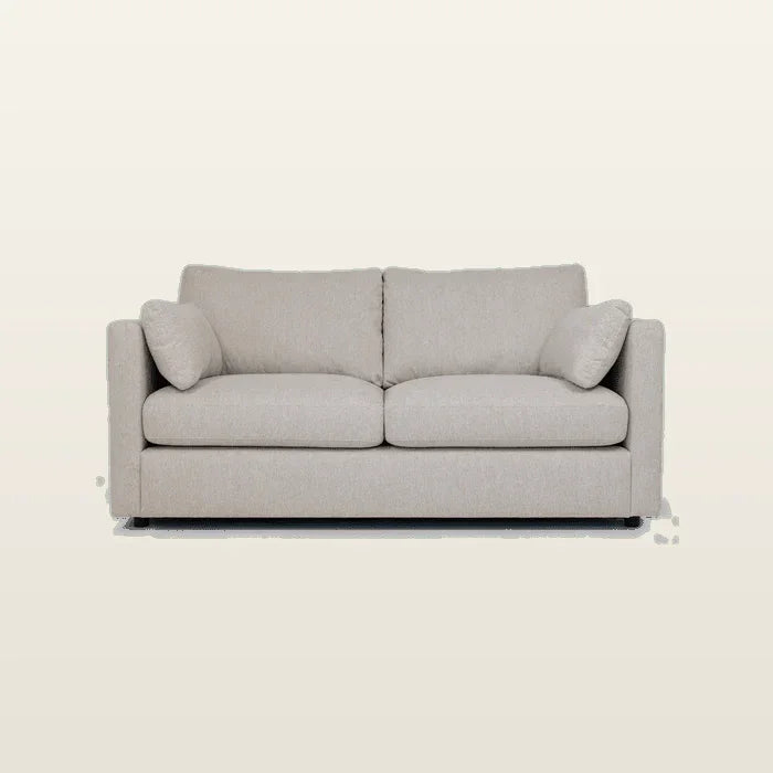 Luxury beige two-seater sofa with plush cushions, modern design for living room comfort