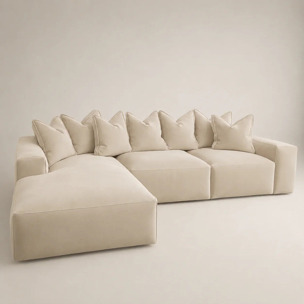 Beige L-shaped sectional sofa with plush cushions, modern luxury living room furniture