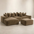 Luxury brown sectional sofa with chaise and ottoman, plush cushions, modern living room furniture