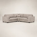 Modern grey L-shaped sectional sofa with plush cushions and dark legs, ideal for luxury living rooms