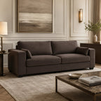 Luxury brown fabric sofa in elegant living room with modern decor and ambient lighting