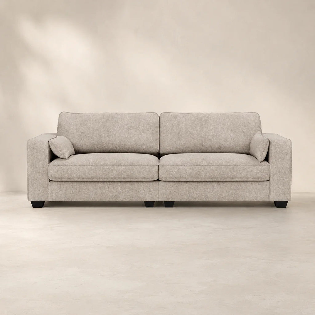 Luxury beige fabric sofa with plush cushions and black legs, ideal for modern living rooms