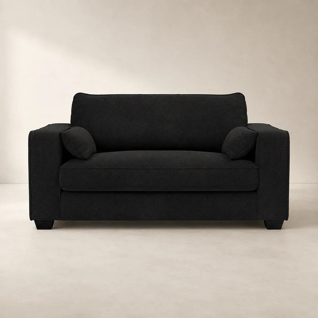 Black fabric sofa with matching cushions, modern living room furniture for luxury home interiors