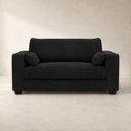 Black fabric sofa with matching cushions, modern living room furniture for luxury home interiors