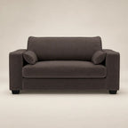 Dark grey fabric sofa with matching cushions, modern design for luxury living rooms